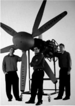 The Stratasys engine with three collaborators